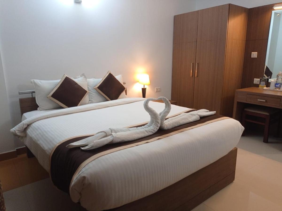 Hotel De Grand Kozhikode Buitenkant foto