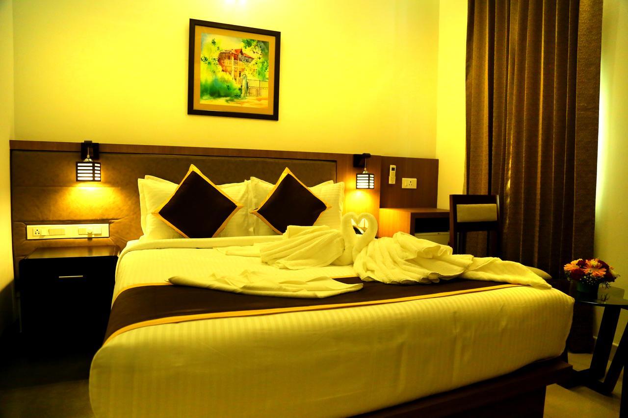 Hotel De Grand Kozhikode Buitenkant foto