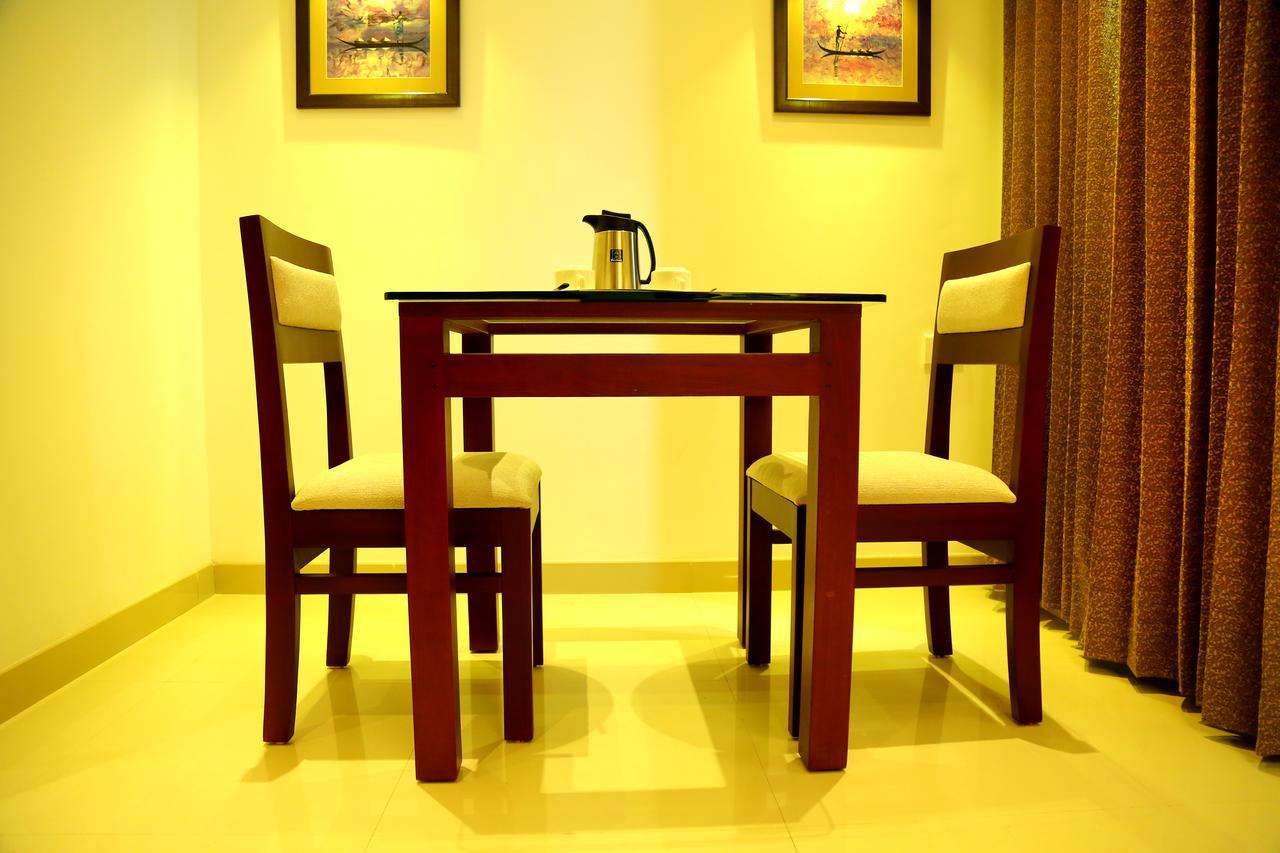 Hotel De Grand Kozhikode Buitenkant foto