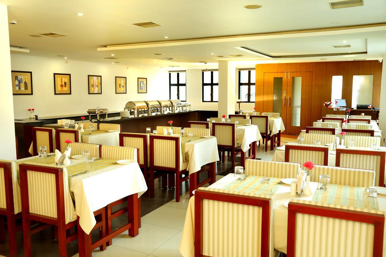 Hotel De Grand Kozhikode Buitenkant foto
